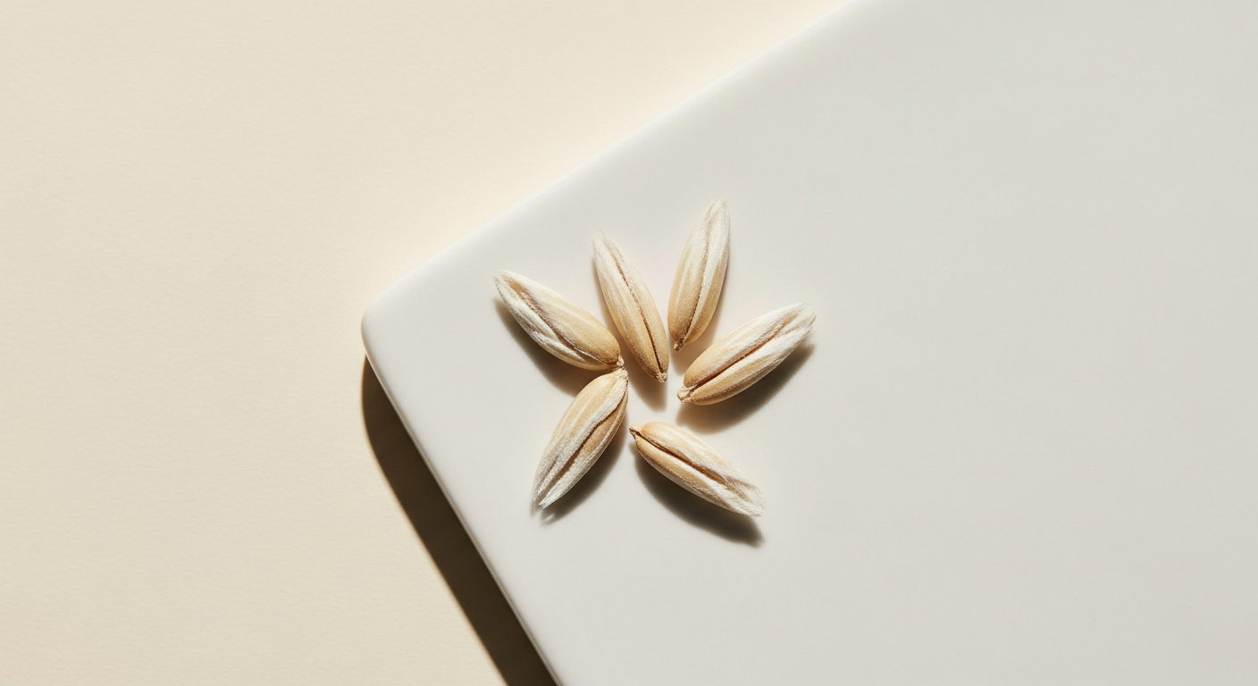 Finely milled Avena Sativa oat kernel flour powder highlighting smooth texture for beauty products