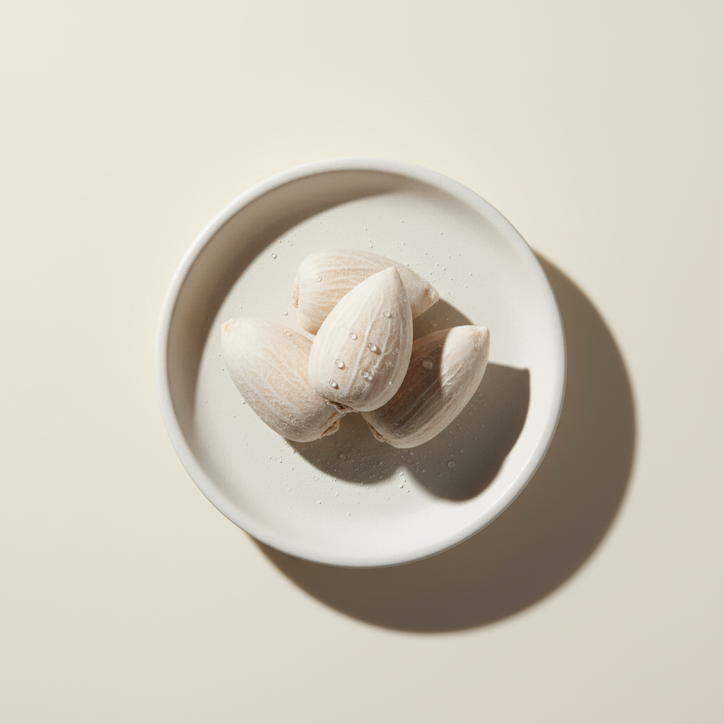 Waxy white flakes of Cetyl Palmitate, a key emollient for skincare products